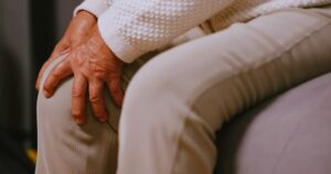 An elderly woman suffering from osteoarthritis.